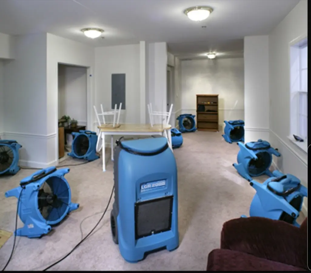 Air movers and dehumidifier setup for Water Damage Restoration in Sturgis